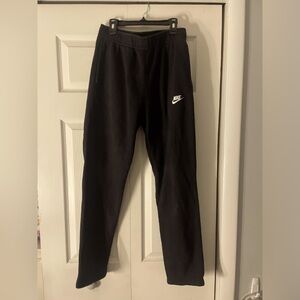 These are black Nike sweat pants
